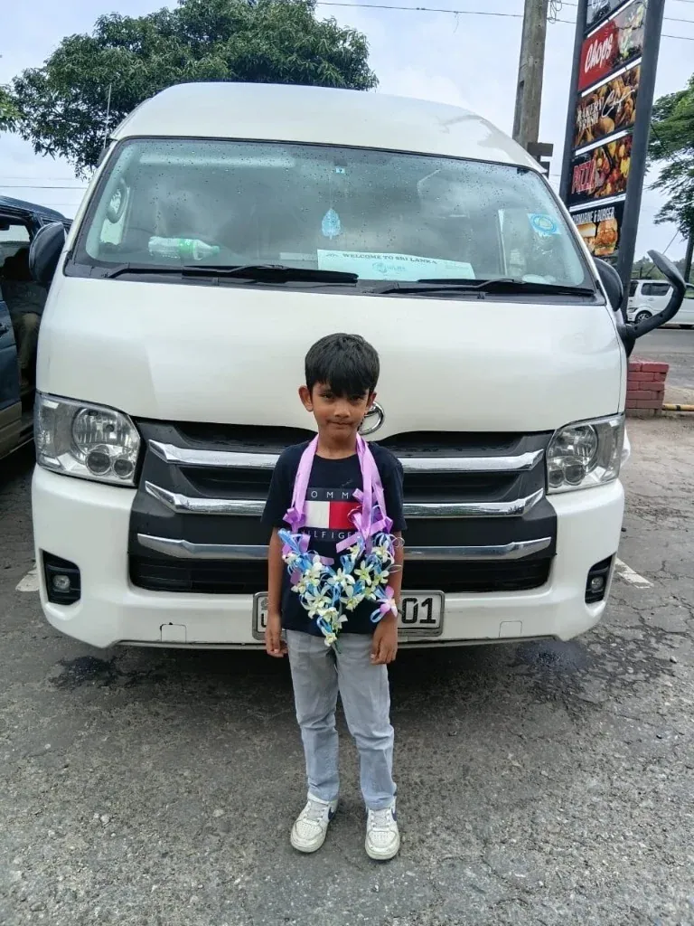 Kings Holidays VIP van exterior with driver and guest